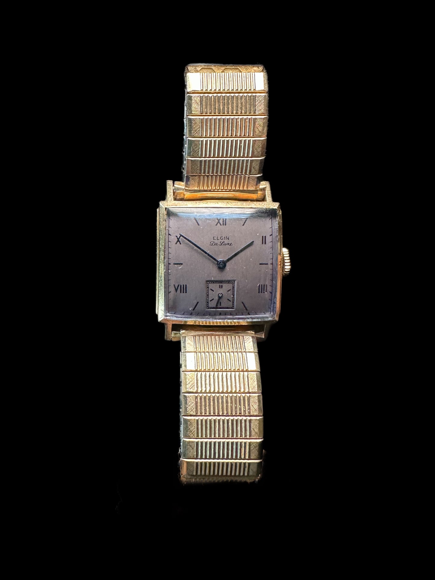 Elgin DeLuxe gold tank manual wind vintage watch